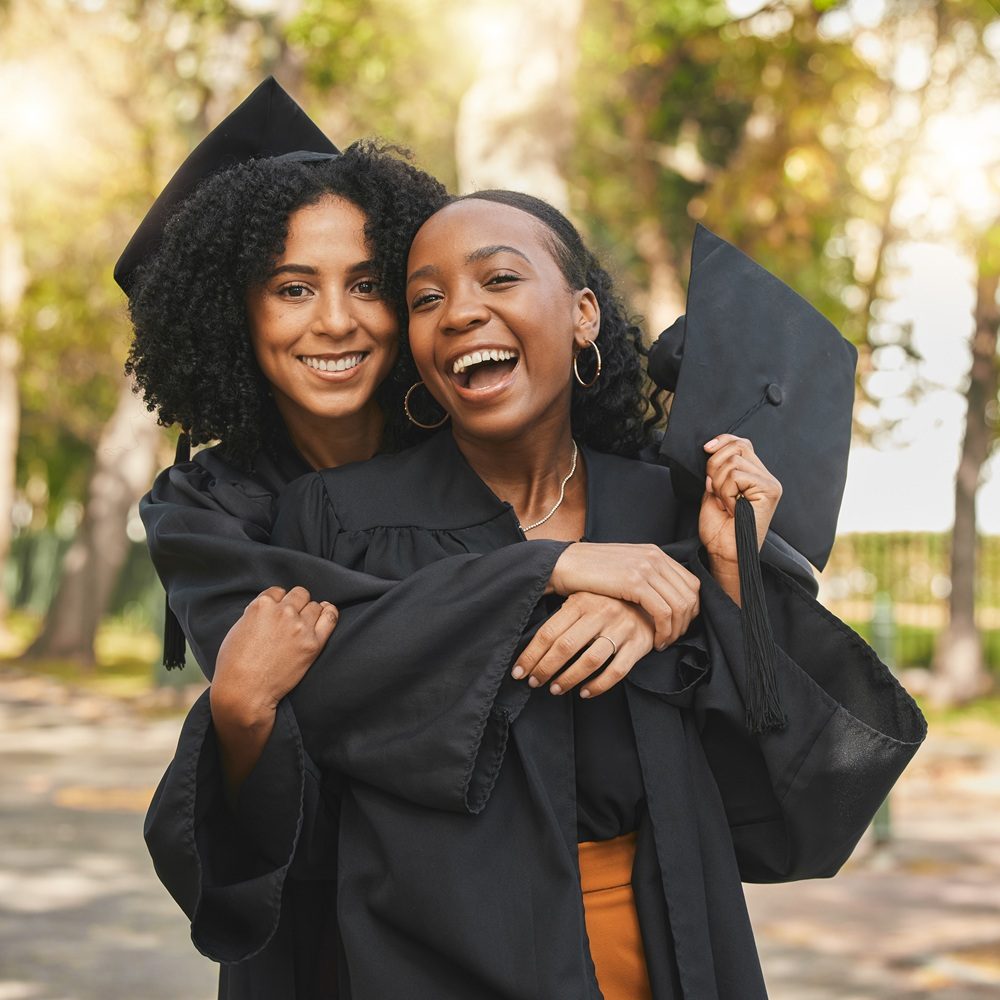 Portrait, graduation and women outdoor, hug and achievement with celebration, diploma and university. People, students and friends embrace, education and outside with happiness, future and support.