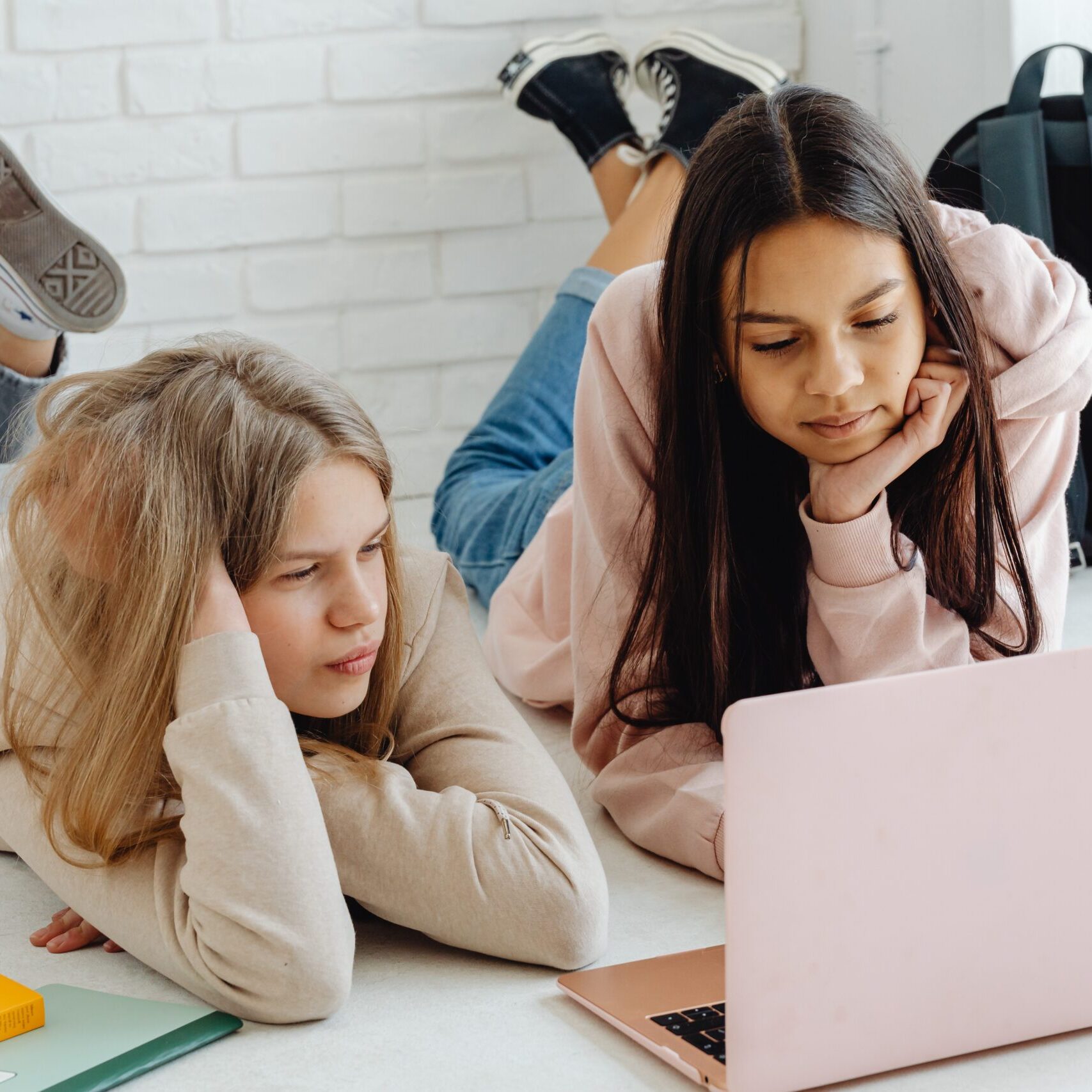 Two girls looking at computer
